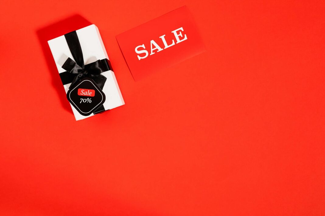 Red background with a gift box and 70% sale tag perfect for promotions.